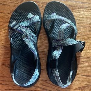 Purple and teal chacos